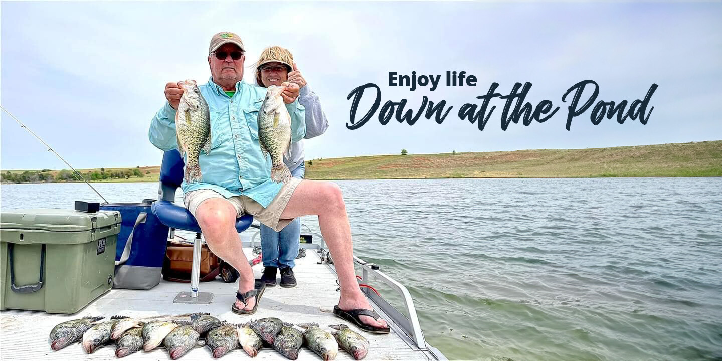 Couple crappie fishing on pontoon boat